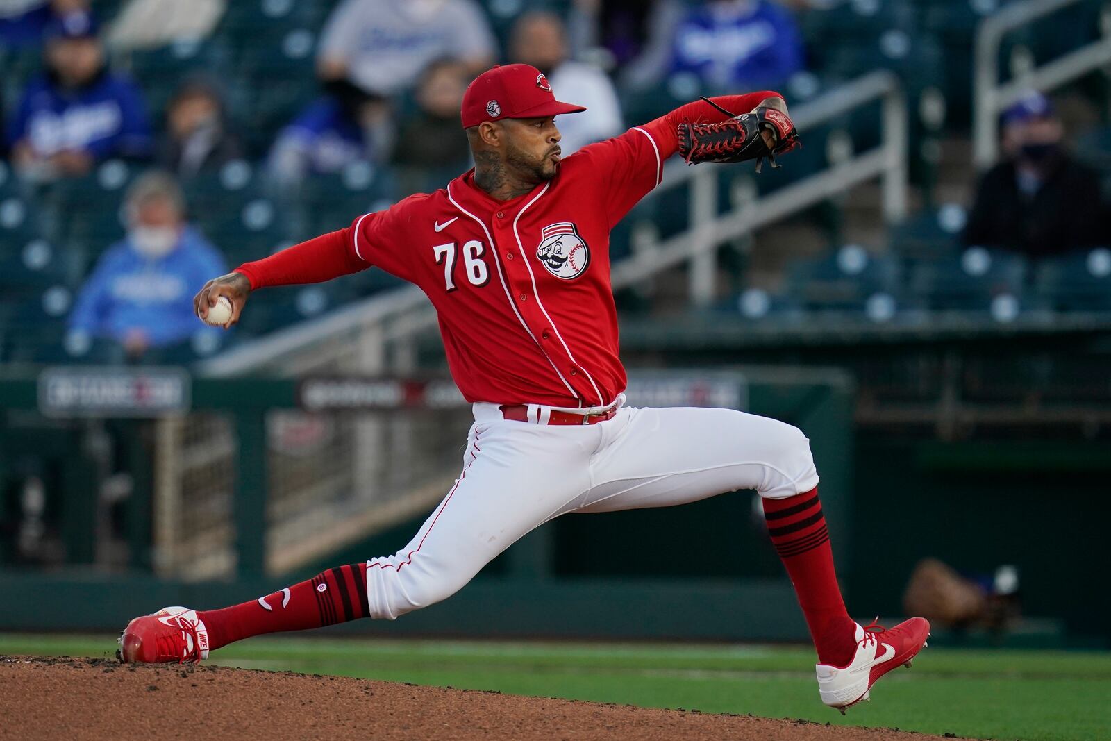 Cincinnati Reds starting pitcher Vladimir Gutierrez throws a pitch against the Los Angeles Dodgers during the first inning a spring training baseball game Tuesday, March 9, 2021, in Goodyear, Ariz. (AP Photo/Ross D. Franklin)