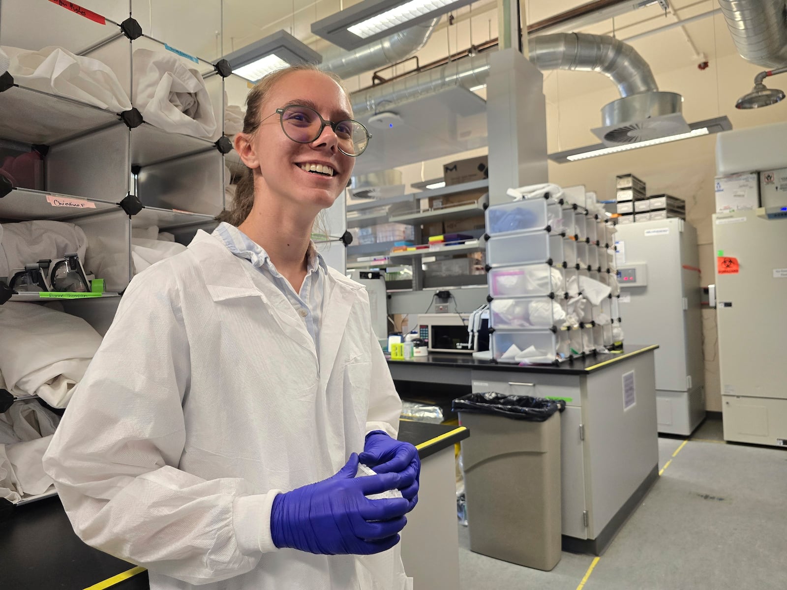 Anna Riley, a microbiology major, wraps up a day of lab work at Northern Arizona University in Flagstaff, Ariz., Friday, Jan. 31, 2025. (AP Photo/Felicia Fonseca)