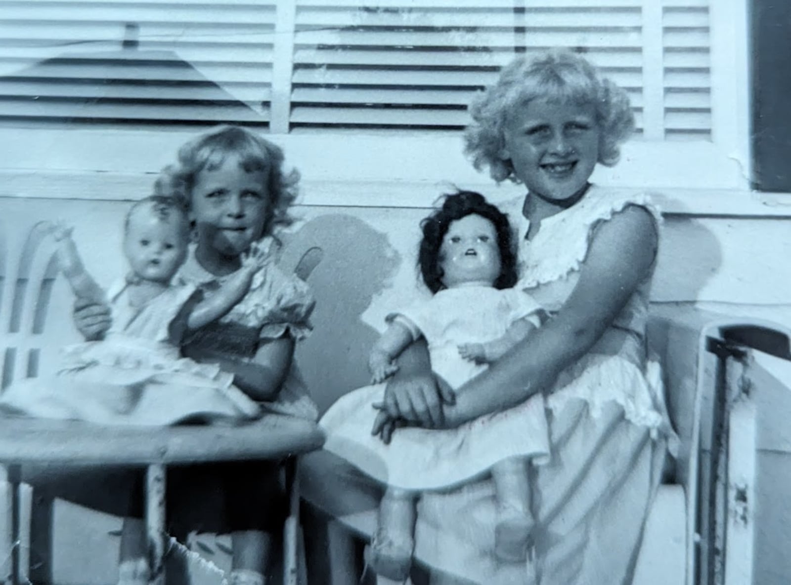 Carole Laycock of Fairfield (right) and her sister, Jane, with dolls in 1949.