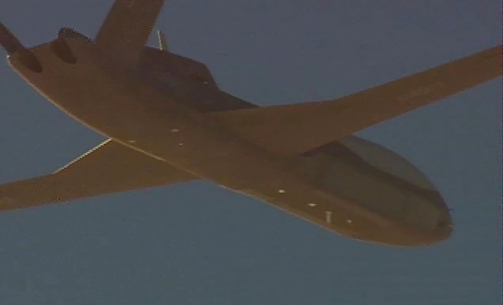 This photograph released by Taiwan Ministry of National Defense taken from a Taiwan Air Force P-3C Orion anti-submarine aircraft, shows a Chinese Cloud Shadow WZ-10 drone near Taiwan, Monday, March 17, 2025. (Taiwan Ministry of National Defense via AP)