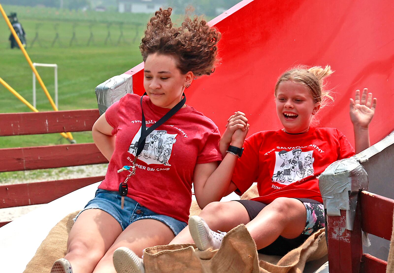 Springfield Salvation Army campers got to have fun at Young's Jersey Dairy Wednesday, June 28, 2023. The campers got lunch, went down the silly slide, played miniature golf and got ice cream. BILL LACKEY/STAFF