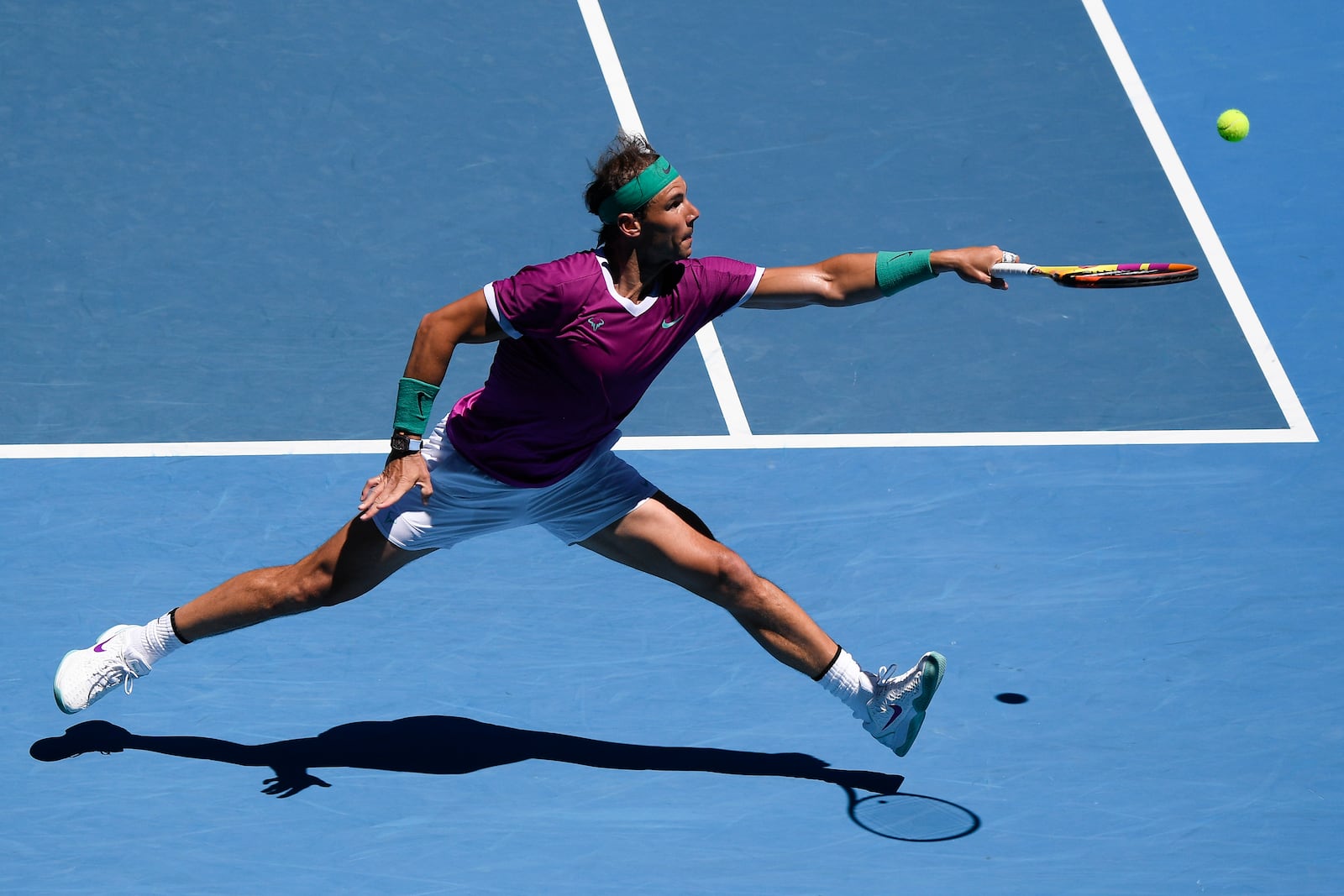 FILE - Rafael Nadal of Spain plays a backhand return to Yannick Hanfmann of Germany during their second round match at the Australian Open tennis championships in Melbourne, Australia, Wednesday, Jan. 19, 2022. (AP Photo/Andy Brownbill, File)