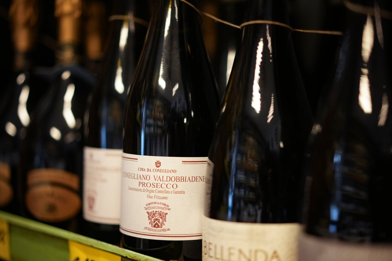 Bottles of Prosecco are lined up on a shelf of a wine shop in Rome, Thursday, Feb. 6, 2025. (AP Photo/Andrew Medichini)