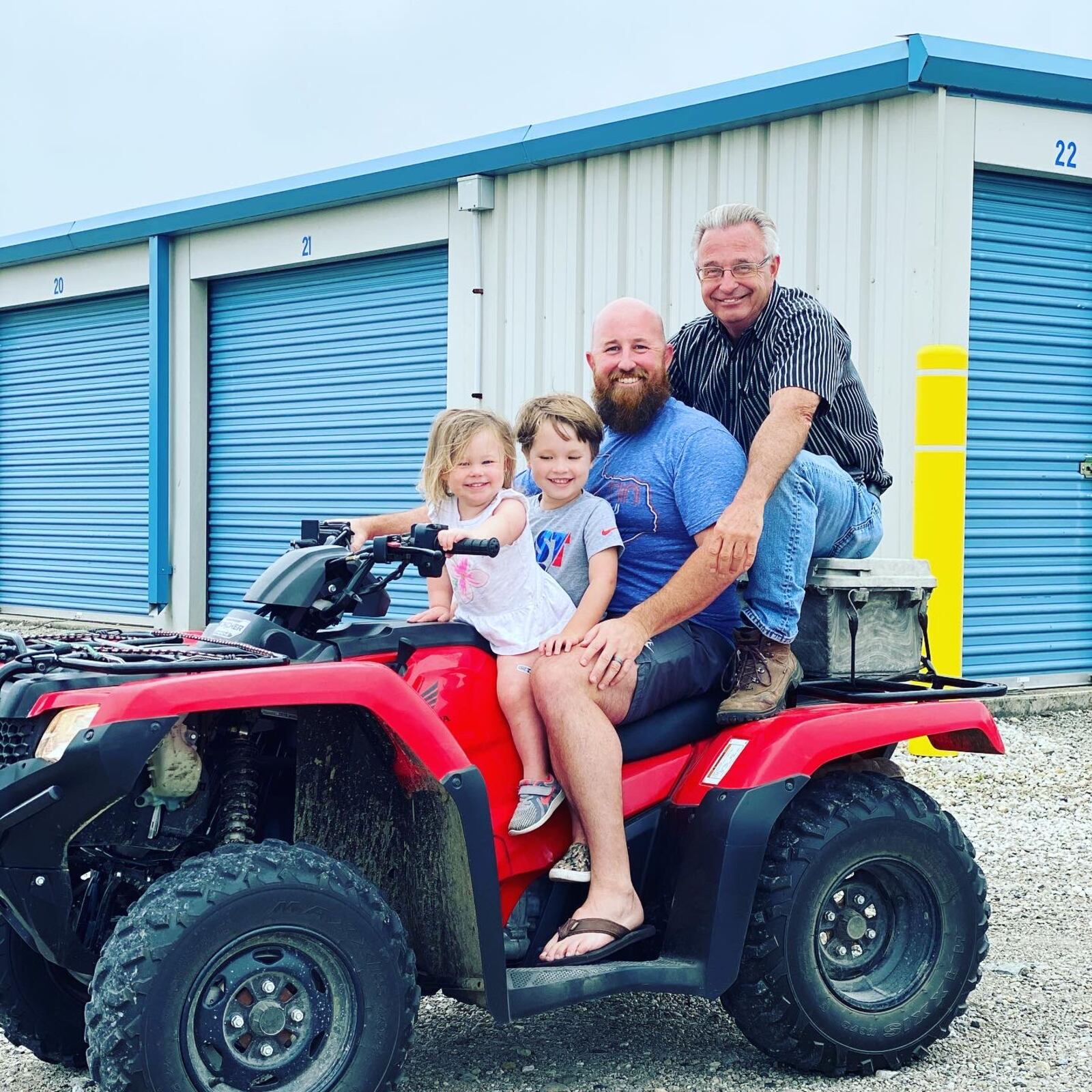 Bob LeVeck (far right) with his son Chris and two of his grandchildren. Bob died from COVID in August. His family is struggling to get through their first Christmas without him. CONTRIBUTED