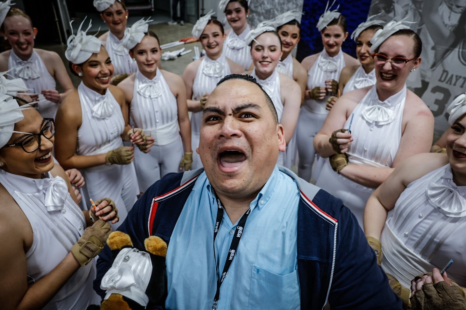 Bellbrook High School color guard coach, Sheldon Apo gets his team ready for competition at  the WGI Color Guard World Championships round 2 at UD Arena Thursday April 13, 2023. JIM NOELKER/STAFF