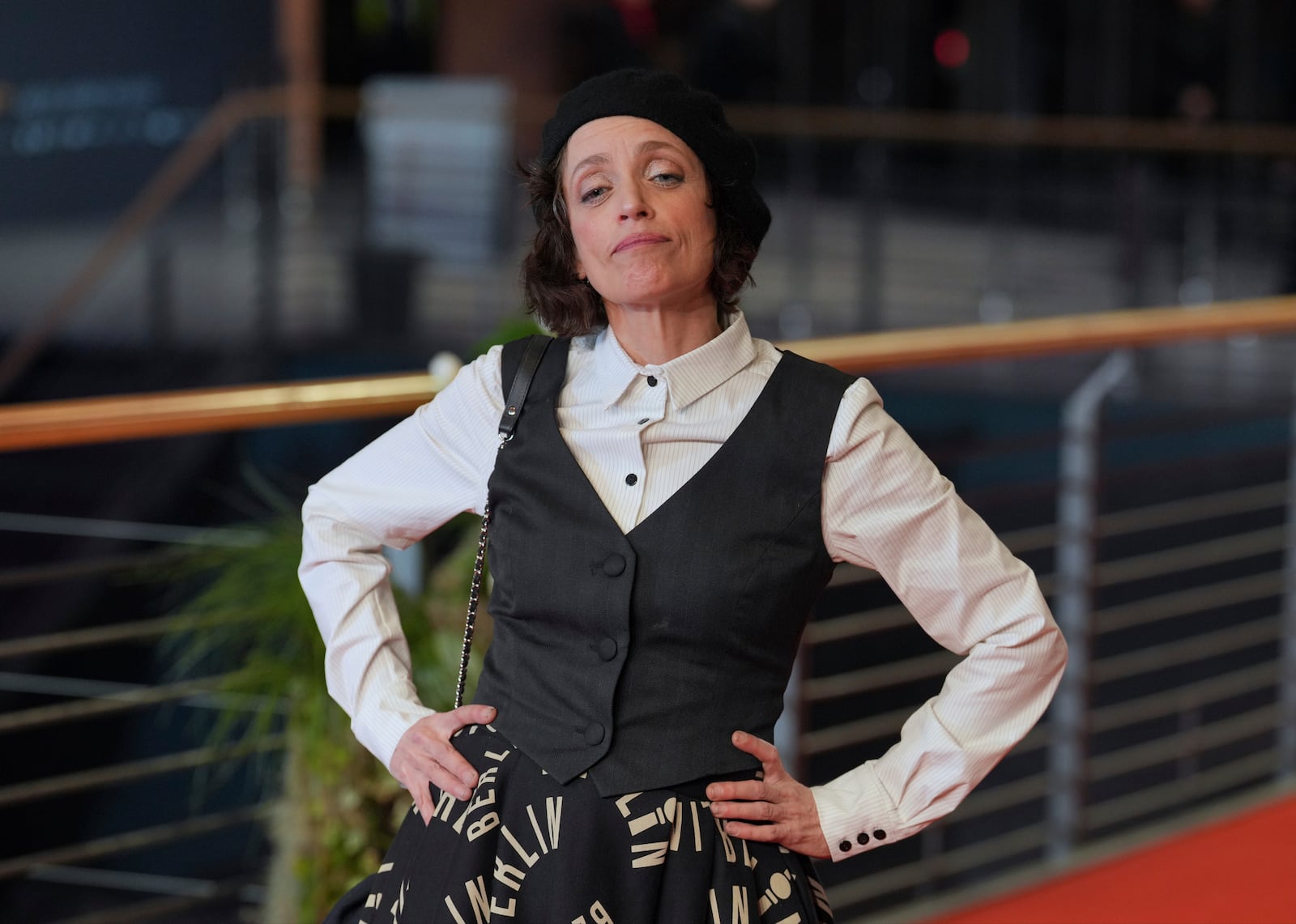 Actress Anna Thalbach poses for photographers upon arrival at the opening of the International Film Festival, Berlinale, in Berlin, Thursday, Feb. 13, 2025. (Soeren Stache/dpa via AP)