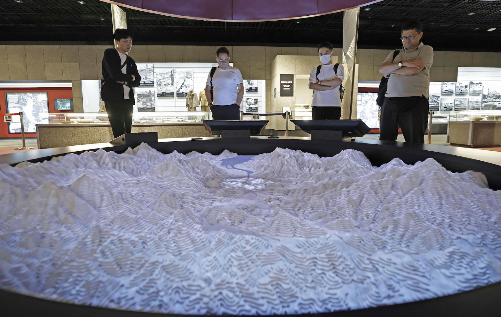 People visit the Atomic Bomb Museum in Nagasaki, southern Japan Saturday, Oct. 12, 2024, a day after the Nobel Peace Prize was awarded to Nihon Hidankyo, a Japanese organization of survivors of the U.S. atomic bombings of Hiroshima and Nagasaki, for its activism against nuclear weapons. (Kyodo News via AP)