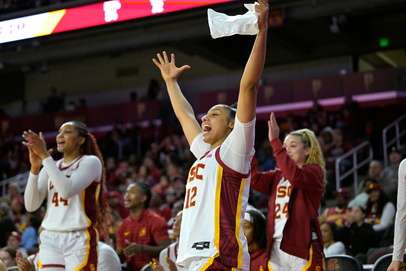 Southern California guard JuJu Watkins (12) reacts on the bench after a basket during the second half of an NCAA college basketball game against Penn State, Sunday, Jan. 12, 2025, in Los Angeles. (AP Photo/Jayne Kamin-Oncea)