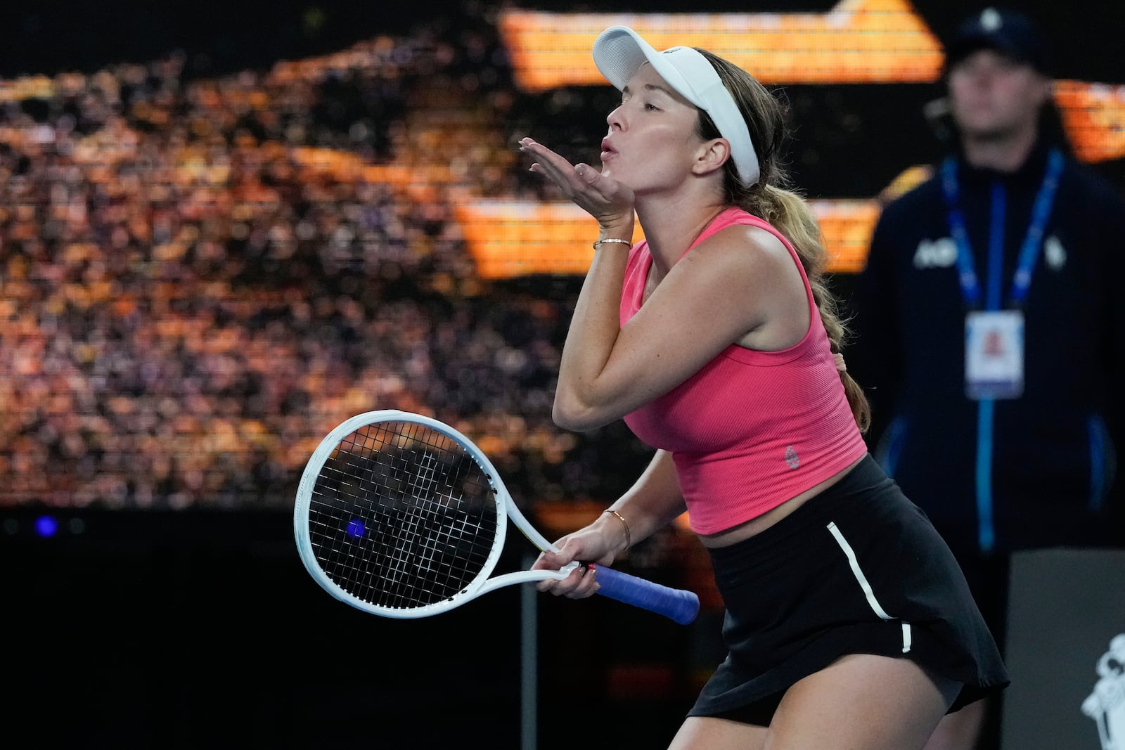 Danielle Collins of the U.S. reacts after defeating Destanee Aiava of Australia in their second round match at the Australian Open tennis championship in Melbourne, Australia, Thursday, Jan. 16, 2025. (AP Photo/Manish Swarup)