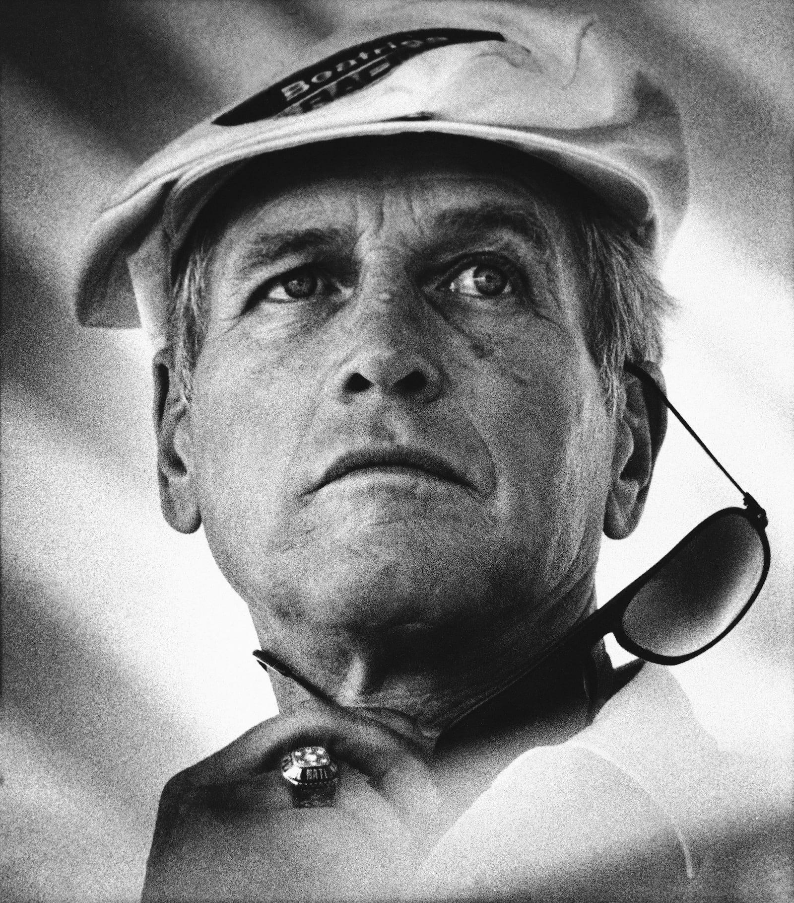 FILE - Actor Paul Newman watches racing at the U.S. Grand Prix in East Rutherford, N.J., June 30, 1985. (AP Photo/Mario Suriani, file)