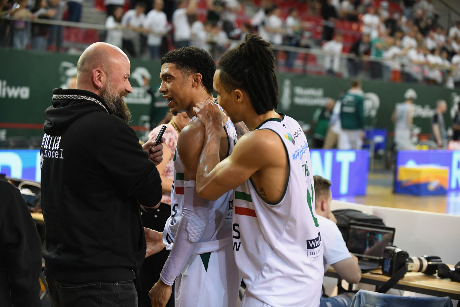 D'Mitrik Trice, left and Travis Trice do an interview while playing for WKS Śląsk Wrocław in Poland in 2022. Photo courtesy of WKS Śląsk Wrocław