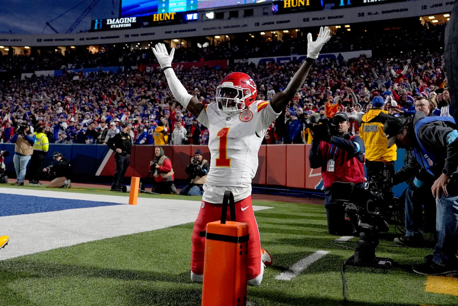 Kansas City Chiefs wide receiver Xavier Worthy (1) celebrates after scoring during the first half of an NFL football game against the Buffalo Bills Sunday, Nov. 17, 2024, in Orchard Park, N.Y. (AP Photo/Julia Demaree Nikhinson)