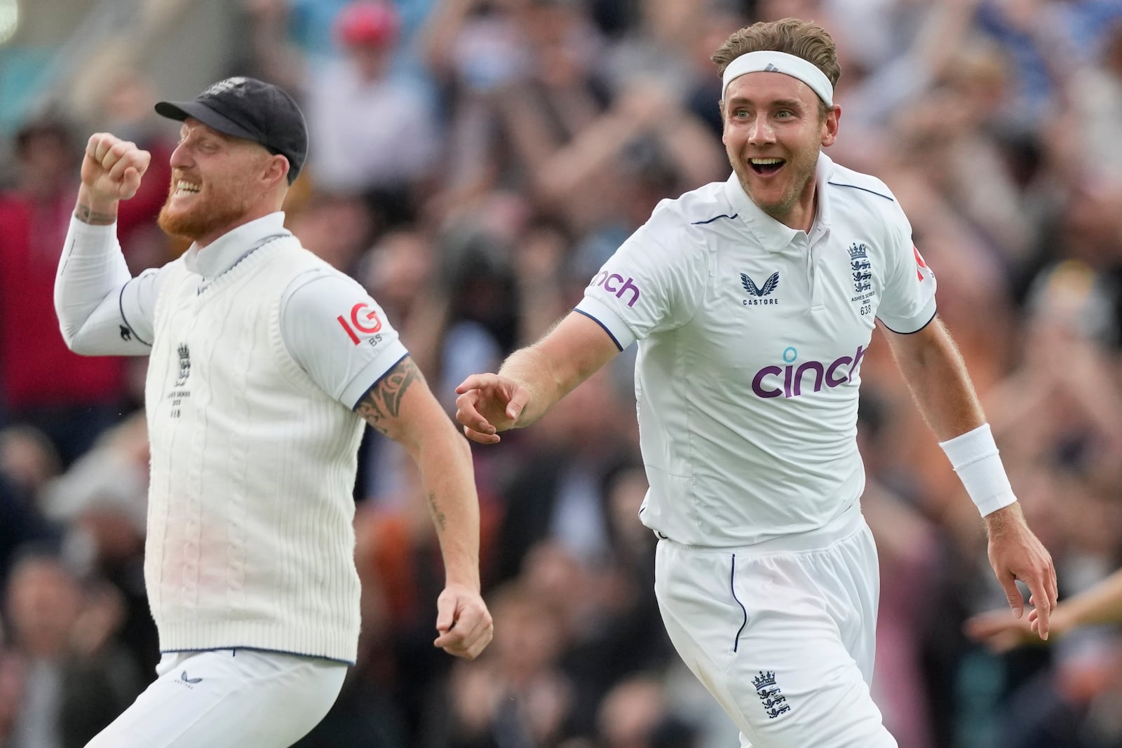 FILE - England's Stuart Broad and England's Ben Stokes celebrate the dismissal of Australia's Todd Murphy on day five of the fifth Ashes Test match between England and Australia, at The Oval cricket ground in London, Monday, July 31, 2023. (AP Photo/Kirsty Wigglesworth, File)