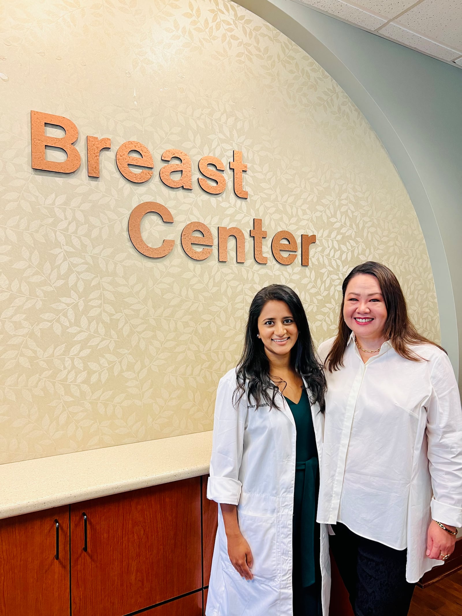 Left to right, Dr. Neha Sarvepalli, a surgical oncologist with Premier Health, with Caroline Mombay, a breast cancer survivor and nurse with Premier Health. COURTESY OF PREMIER HEALTH