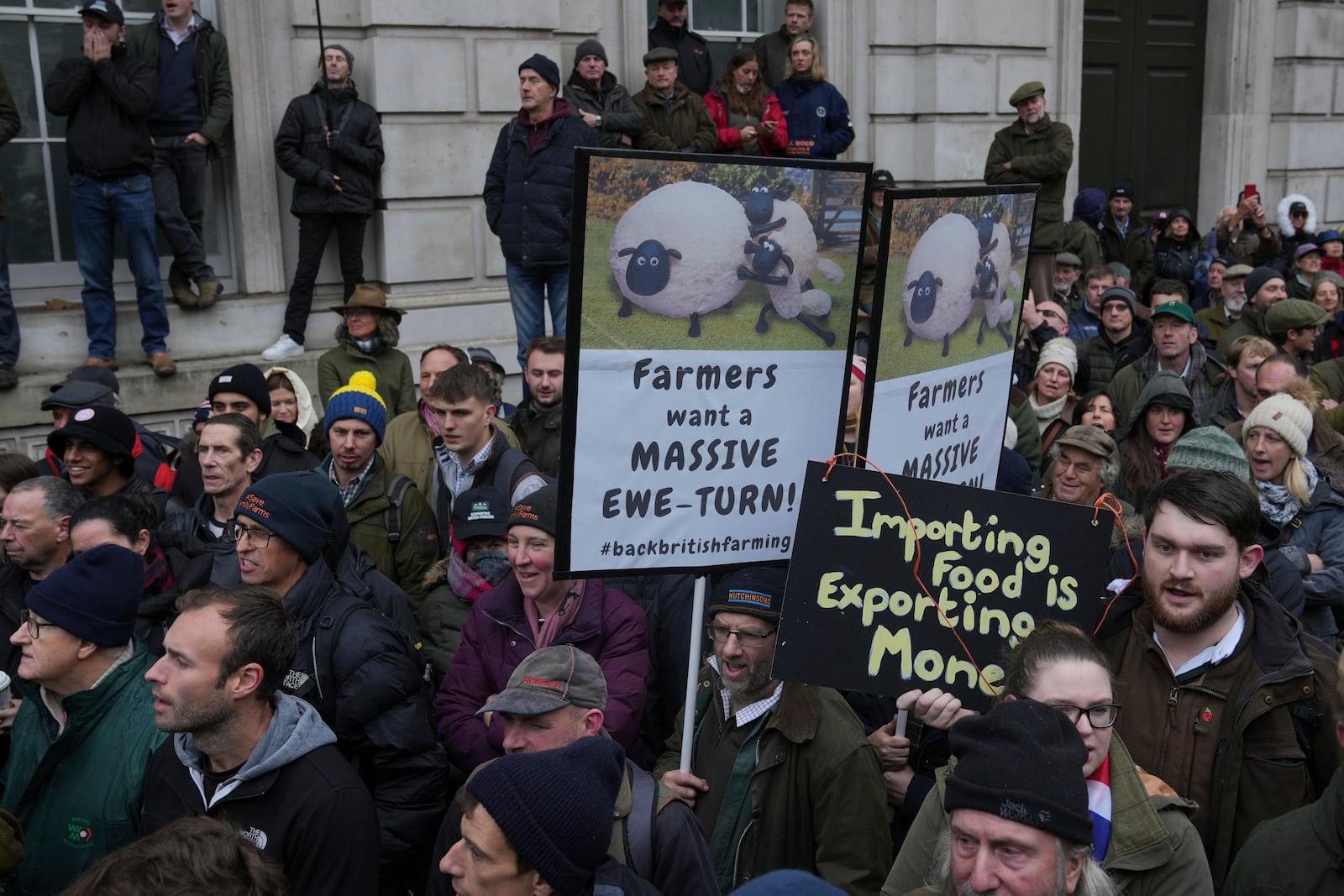 The National Farmers' Union members attend a protest against the planned changes to tax rules, in London, Tuesday, Nov. 19, 2024. (AP Photo/Kin Cheung)