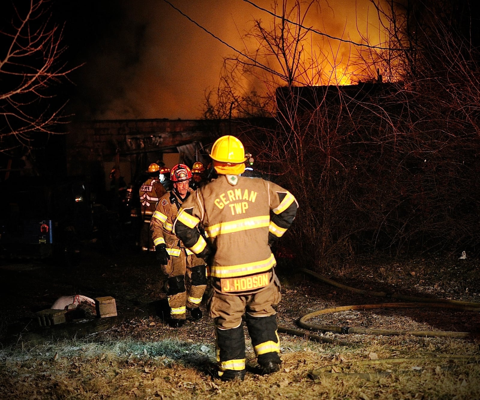 Firefighters from German Township assisted Springfield Township firefighters at a house fire Sunday, Dec. 18, 2022, just west of Springfield. MARSHALL GORBY/STAFF