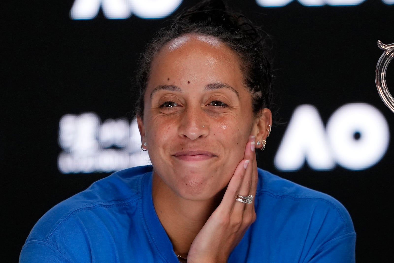 Madison Keys of the U.S. reacts during a press conference after defeating Aryna Sabalenka of Belarus in the women's singles final at the Australian Open tennis championship to win the Daphne Akhurst Memorial Cup, in Melbourne, Australia, Saturday, Jan. 25, 2025. (AP Photo/Vincent Thian)