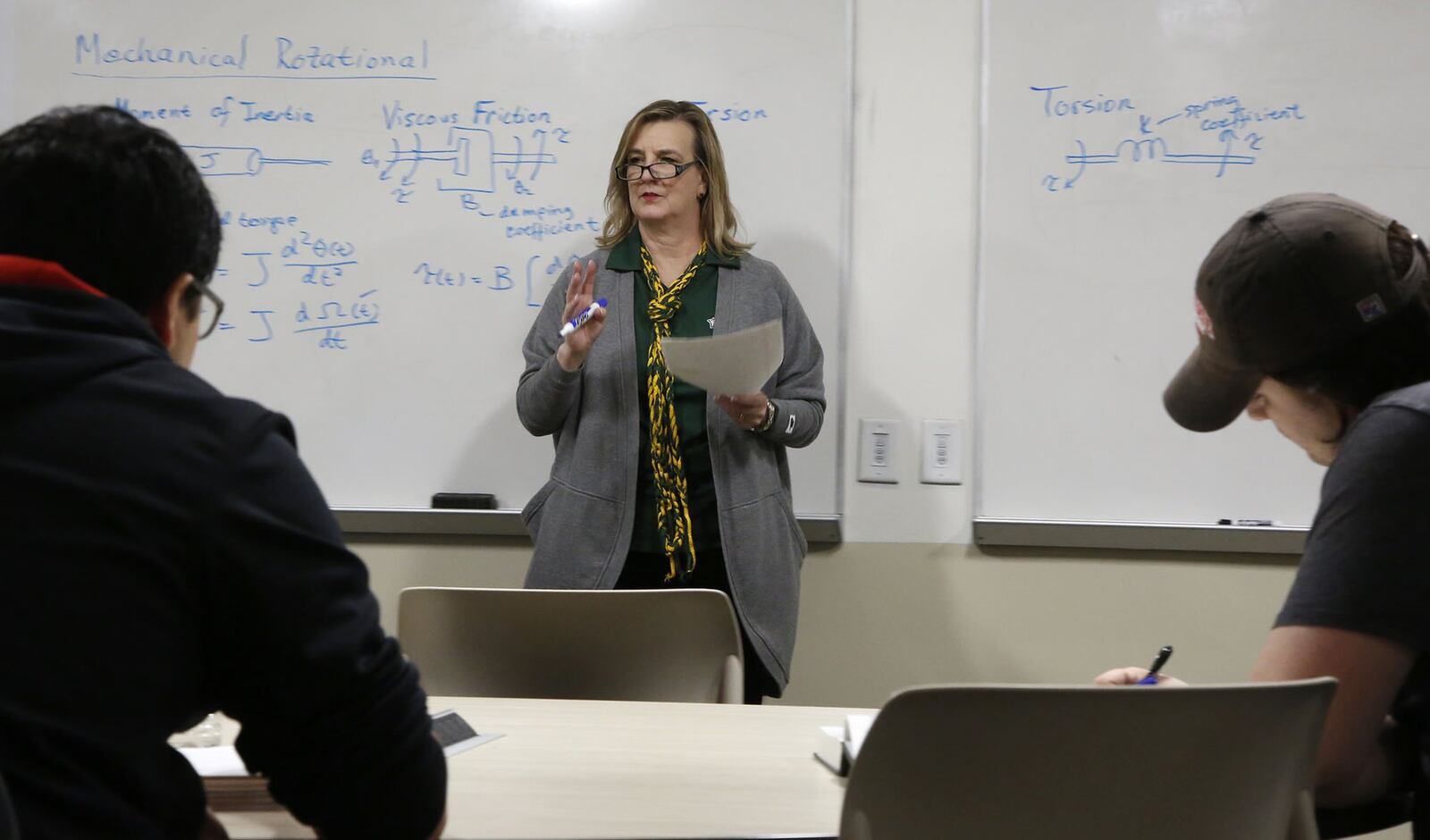 Wright State University president Cheryl Schrader taught an engineering class on Thursday as striking professors picketed in front of campus and students held a sit-in at her office front door. TY GREENLEES / STAFF