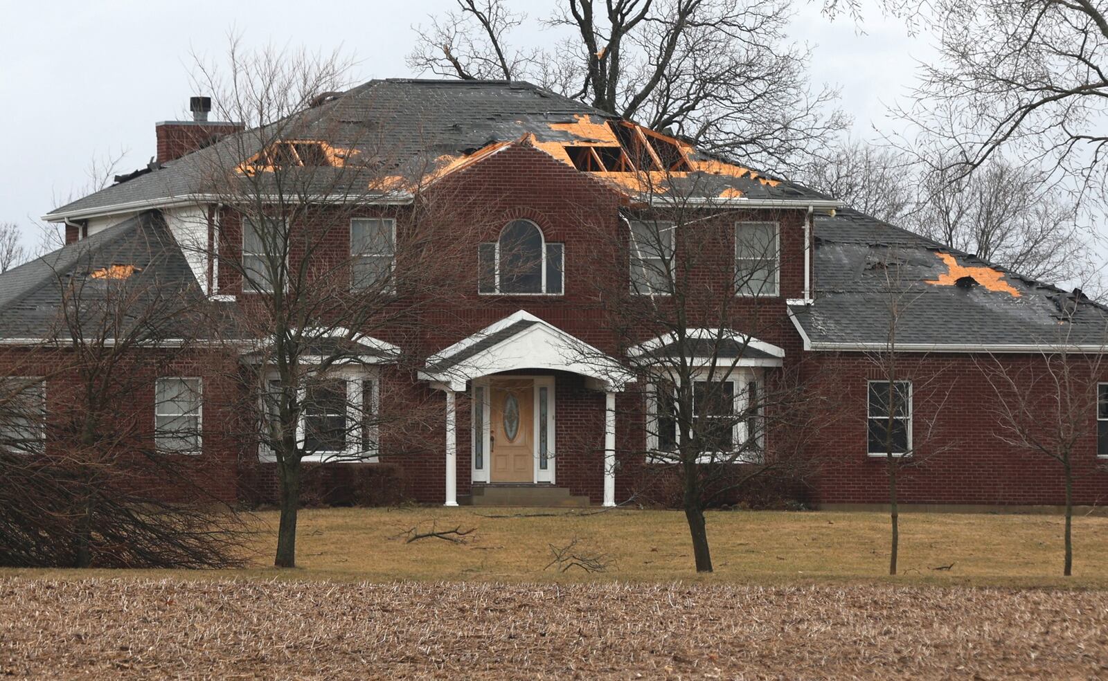 A damaged house along Stott Road in northwestern Clark County Monday, Feb. 27, 2023.  Storms came through the region, triggering tornado warnings. BILL LACKEY/STAFF