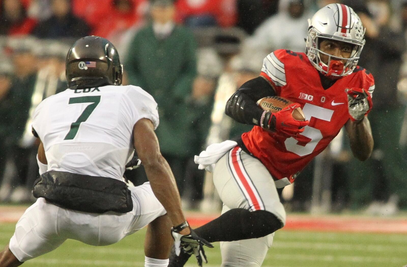 Ohio State’s Braxton Miller carries the ball on Saturday, Nov. 21, 2015, at Ohio Stadium in Columbus. David Jablonski/Staff