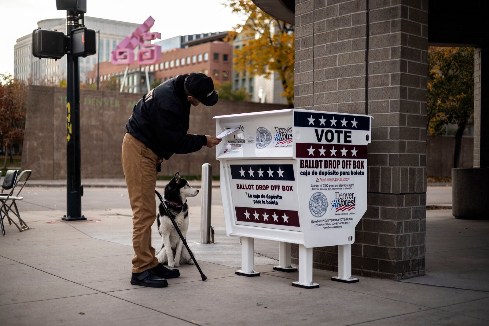 A voter casts their ballot at a drop box in Denver on Election Day, Tuesday, Nov. 5, 2024. (AP Photo/Chet Strange)