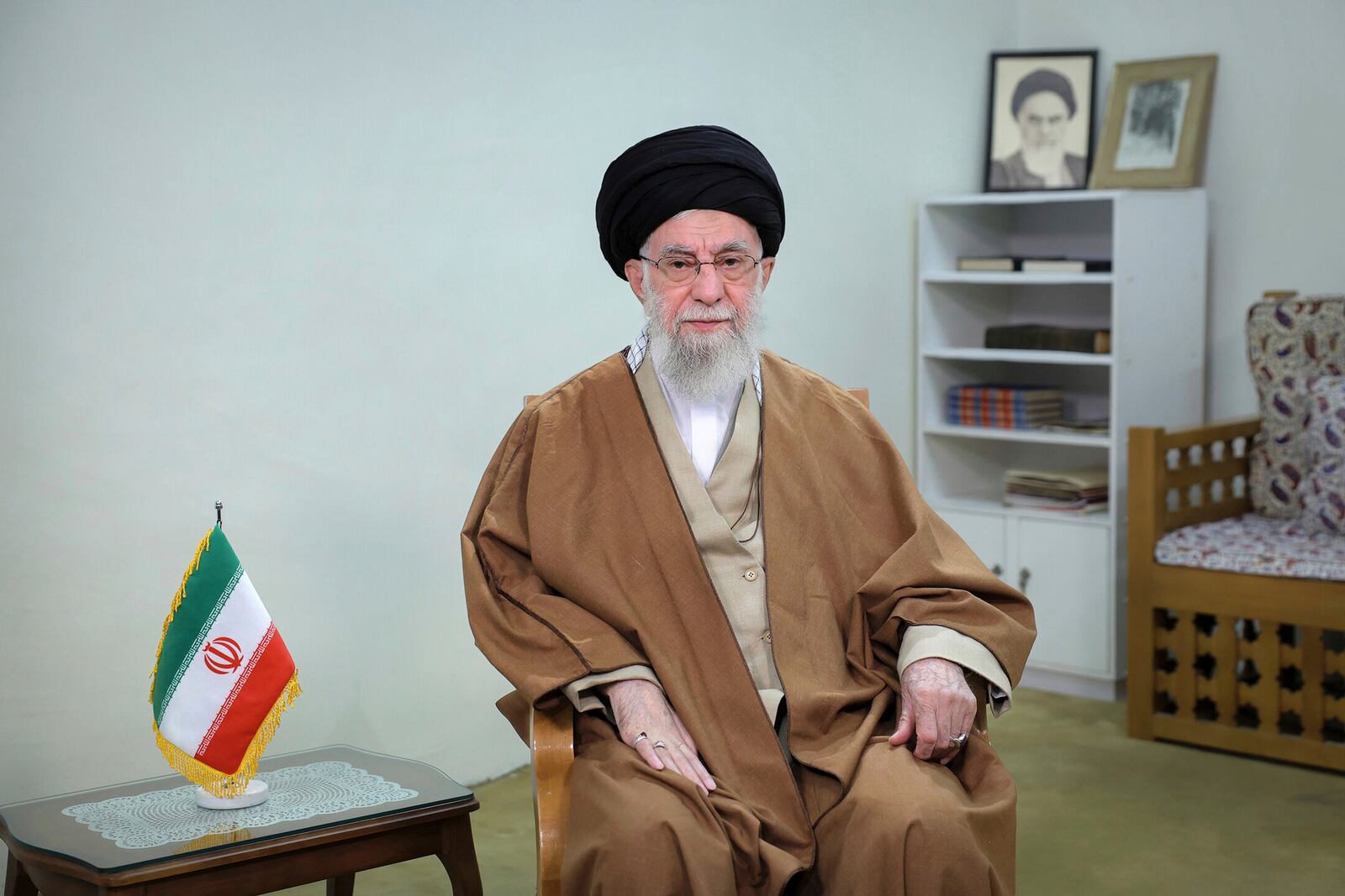 In this photo released by the official website of the office of the Iranian supreme leader, Supreme Leader Ayatollah Ali Khamenei addresses the nation in a televised speech marking the Iranian New Year, or Nowruz, in Tehran, Iran, Thursday, March 20, 2025. (Office of the Iranian Supreme Leader via AP)