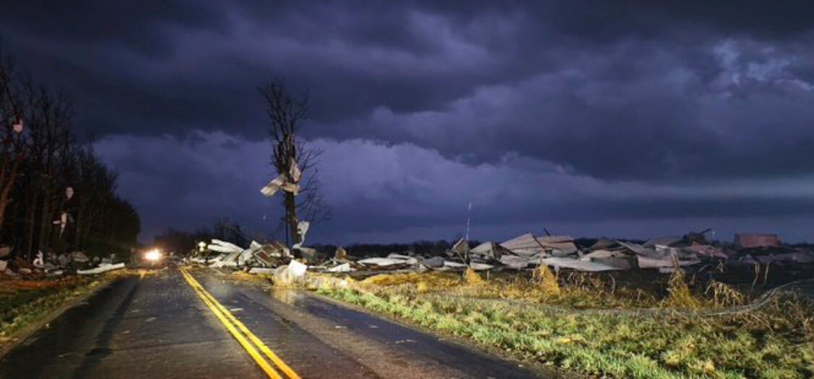 Debris covers the road during a severe storm passed the area north of Seymour, Mo., in Webster County late Friday, March 14, 2025. (Trooper Austin James/Missouri State Highway Patrol via AP)