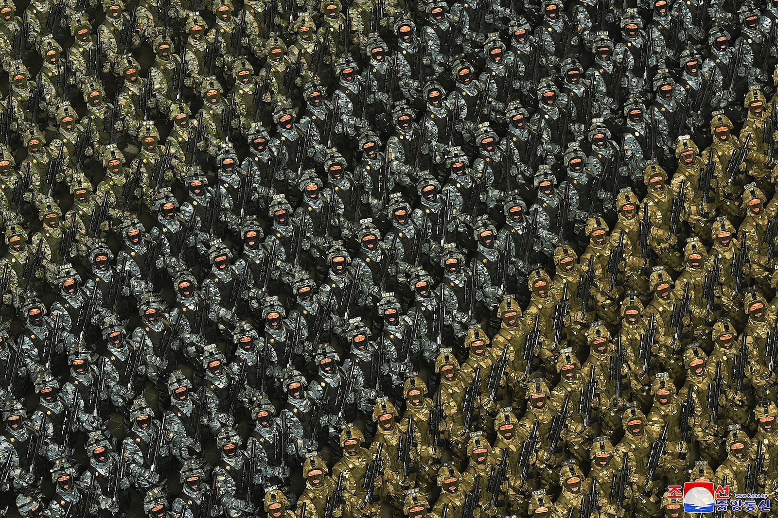 FILE - In this photo provided by the North Korean government, soldiers march during a military parade to mark the 75th founding anniversary of the Korean People's Army on Kim Il Sung Square in Pyongyang, North Korea, on Feb. 8, 2023. Independent journalists were not given access to cover the event depicted in this image distributed by the North Korean government. The content of this image is as provided and cannot be independently verified. Korean language watermark on image as provided by source reads: "KCNA" which is the abbreviation for Korean Central News Agency. (Korean Central News Agency/Korea News Service via AP, File)