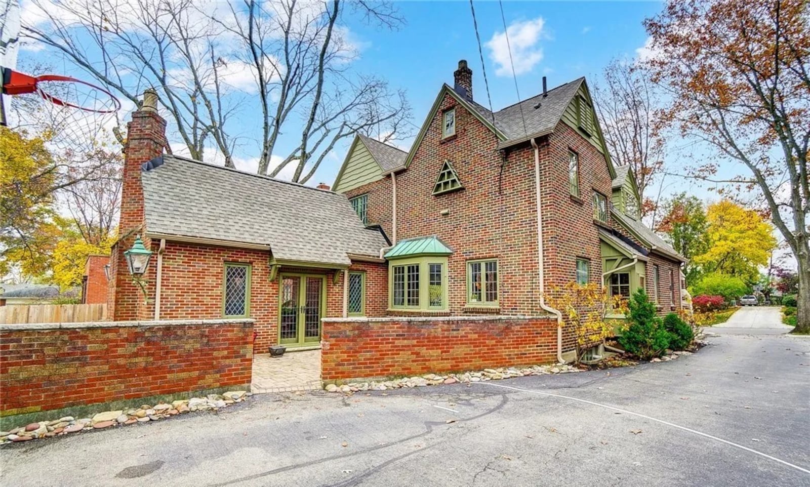 Listed for $575,000 by Sibcy Cline Realtors, this two-story home at 153 Spirea Drive in Oakwood has about 2,663 feet of living space plus a full basement finished to match the Tudor style. CONTRIBUTED