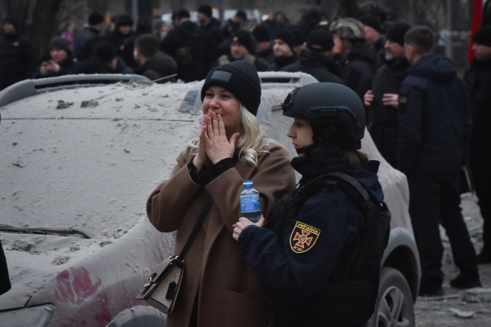 A woman cries after a Russian missile hit a private medical clinic in Zaporizhzhia, Ukraine, Tuesday, Dec. 10, 2024. (AP Photo/Andriy Andriyenko)