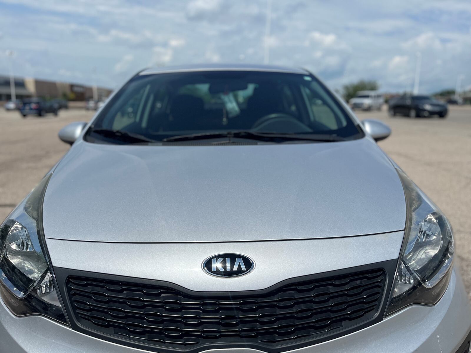 A Kia parked in a lot of a local shopping plaza. CORNELIUS FROLIK / STAFF