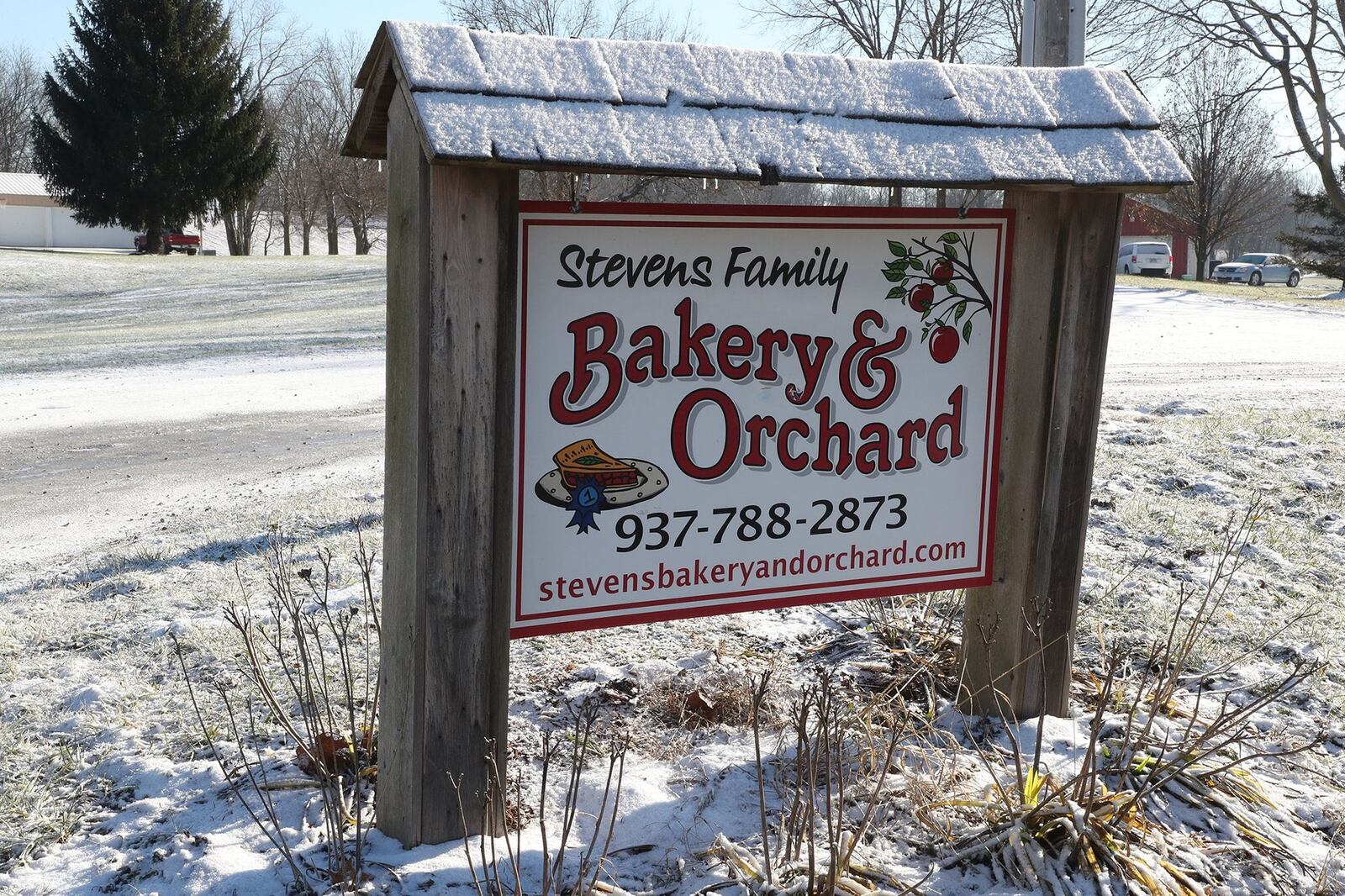 The Stevens Family Bakery & Orchard sign along Thackery Road. BILL LACKEY/STAFF