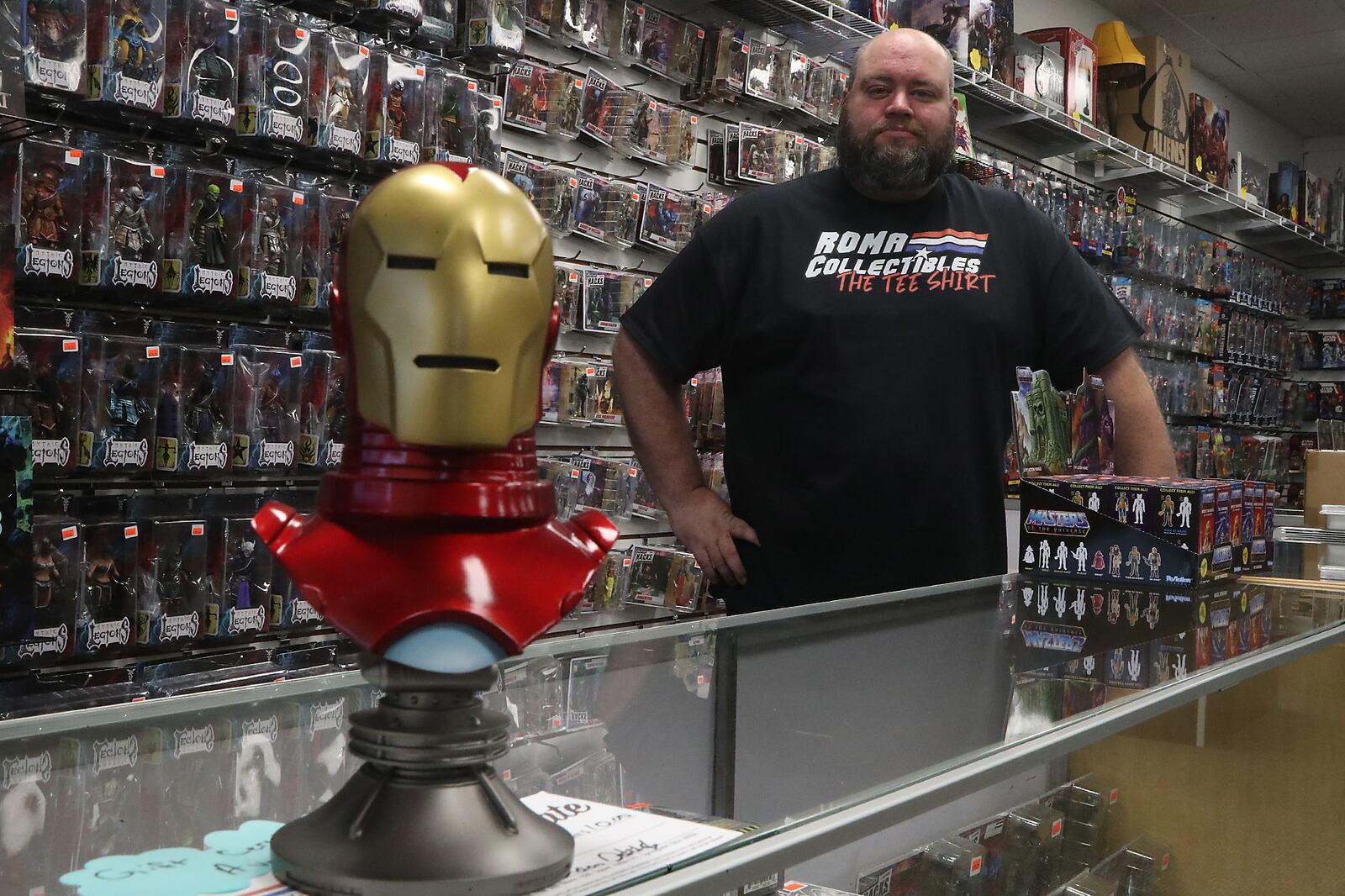 Aaron Detrick, the owner of Roma Collectibles The Toy Store, has thousands of toys in his new store on Upper Valley Pike. BILL LACKEY/STAFF