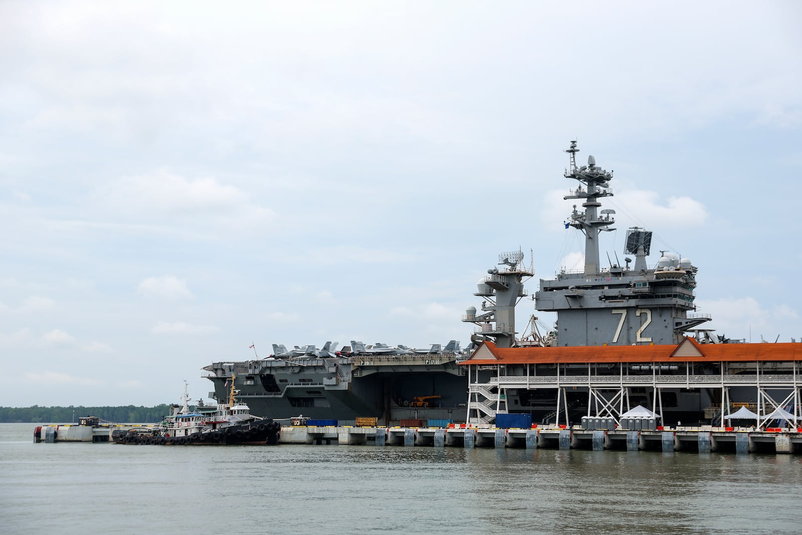 The Nimitz-class aircraft carrier USS Abraham Lincoln is docked during a media tour in Port Klang, on the outskirts of Kuala Lumpur, Malaysia, Tuesday, Nov. 26, 2024.(Fazry Ismail/Pool Photo via AP)