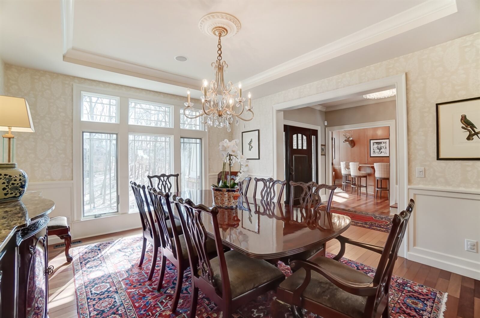 Brazilian cherry hardwood flooring fills the entire first floor, flowing from the foyer into the dining room, great room, kitchen and hearth room. 