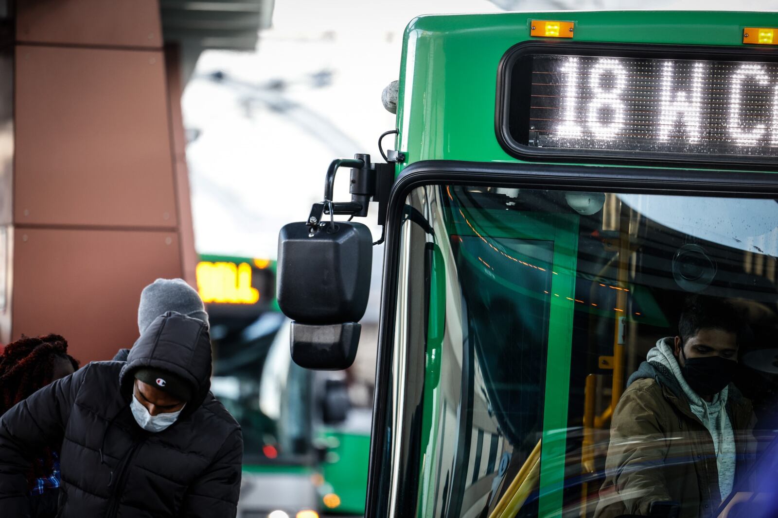 The RTA Hub on Main St. was busy on Wednesday with people coming and going to work. The Greater Dayton Regional Transit Authority announced it will temporarily reduce service because of rising absences likely due to COVID and lower ridership during the public health crisis.  JIM NOELKER/STAFF