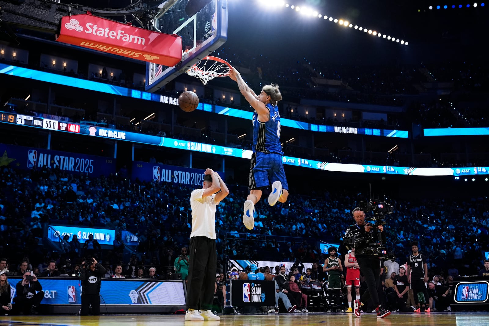 Orlando Magic guard Mac McClung dunks during the slam dunk contest at the NBA basketball All-Star Saturday night festivities Saturday, Feb. 15, 2025, in San Francisco. (AP Photo/Godofredo A. Vásquez)