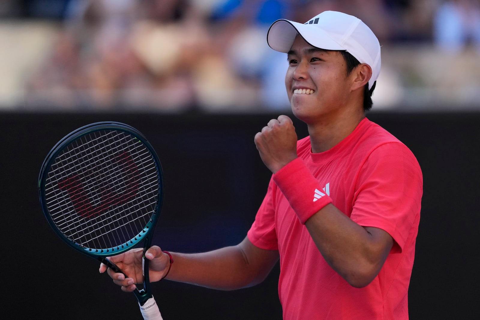 Learner Tien of the U.S. celebrates after defeating Corentin Moutet of France in their third round match at the Australian Open tennis championship in Melbourne, Australia, Saturday, Jan. 18, 2025. (AP Photo/Vincent Thian)