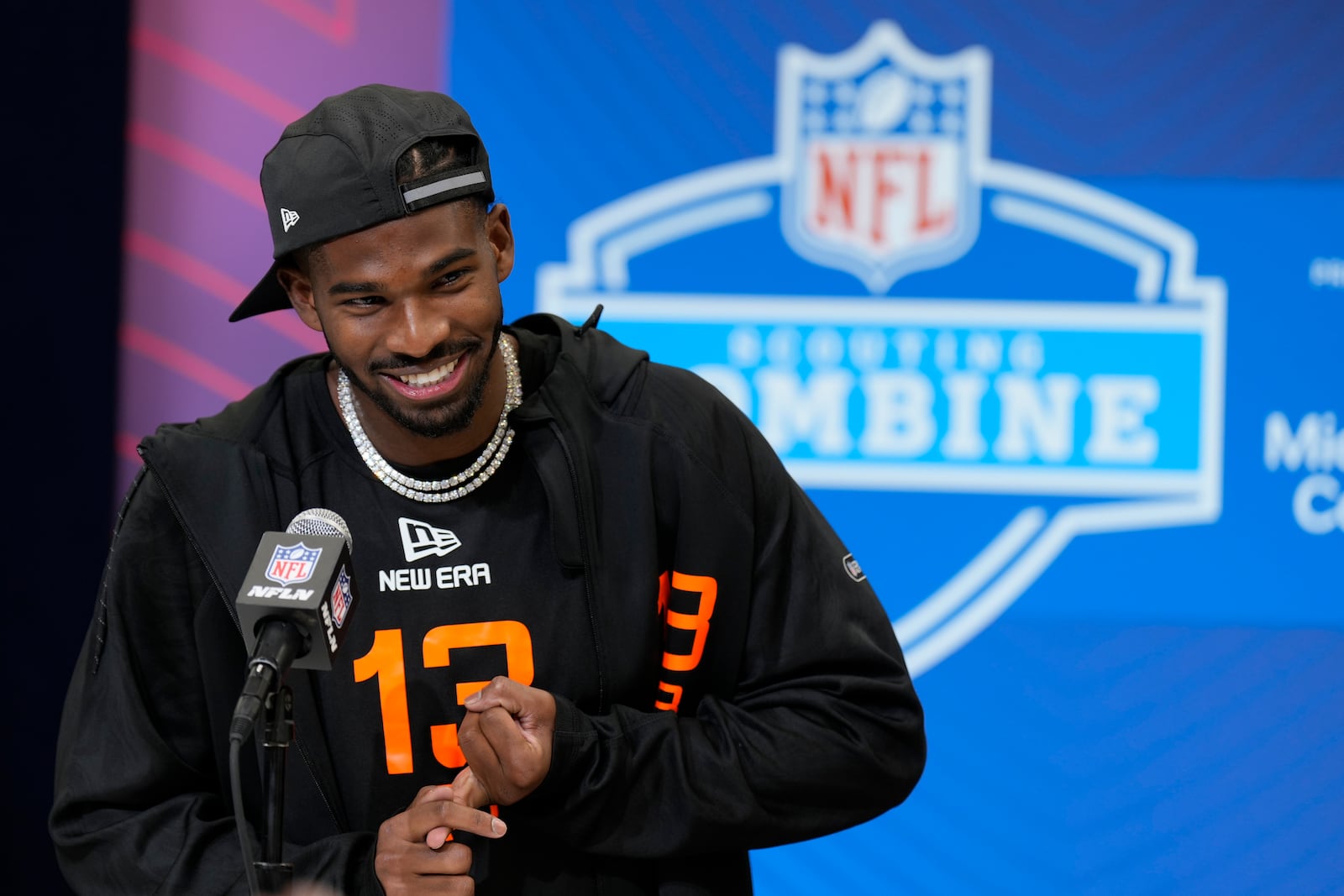 Colorado quarterback Shedeur Sanders speaks during a press conference at the NFL football scouting combine Friday, Feb. 28, 2025, in Indianapolis. (AP Photo/George Walker IV)