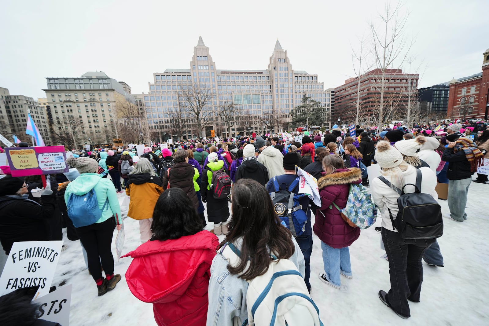 A group gathers at Franklin Park before the People's March, Saturday, Jan. 18, 2025, in Washington. (AP Photo/Julio Cortez)