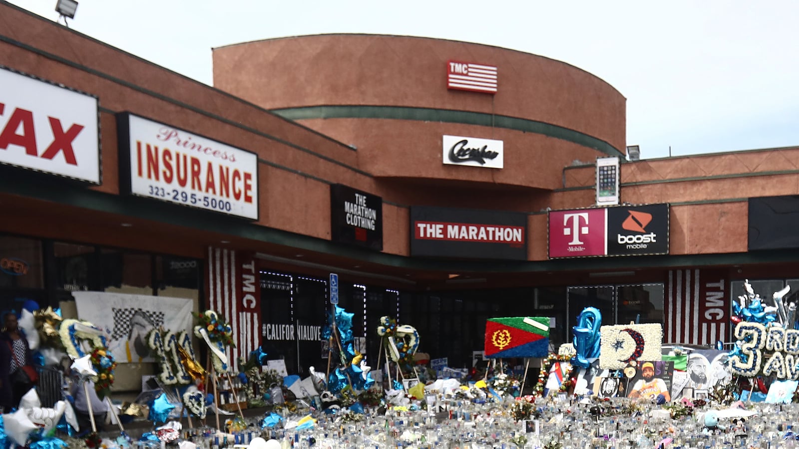 A memorial is seen outside The Marathon Clothing store before the funeral procession for slain hip hop artist Nipsey Hussle on April 11, 2019 in Los Angeles, California. Nipsey Hussle was shot and killed in front of the store on March 31, 2019 in Los Angeles.