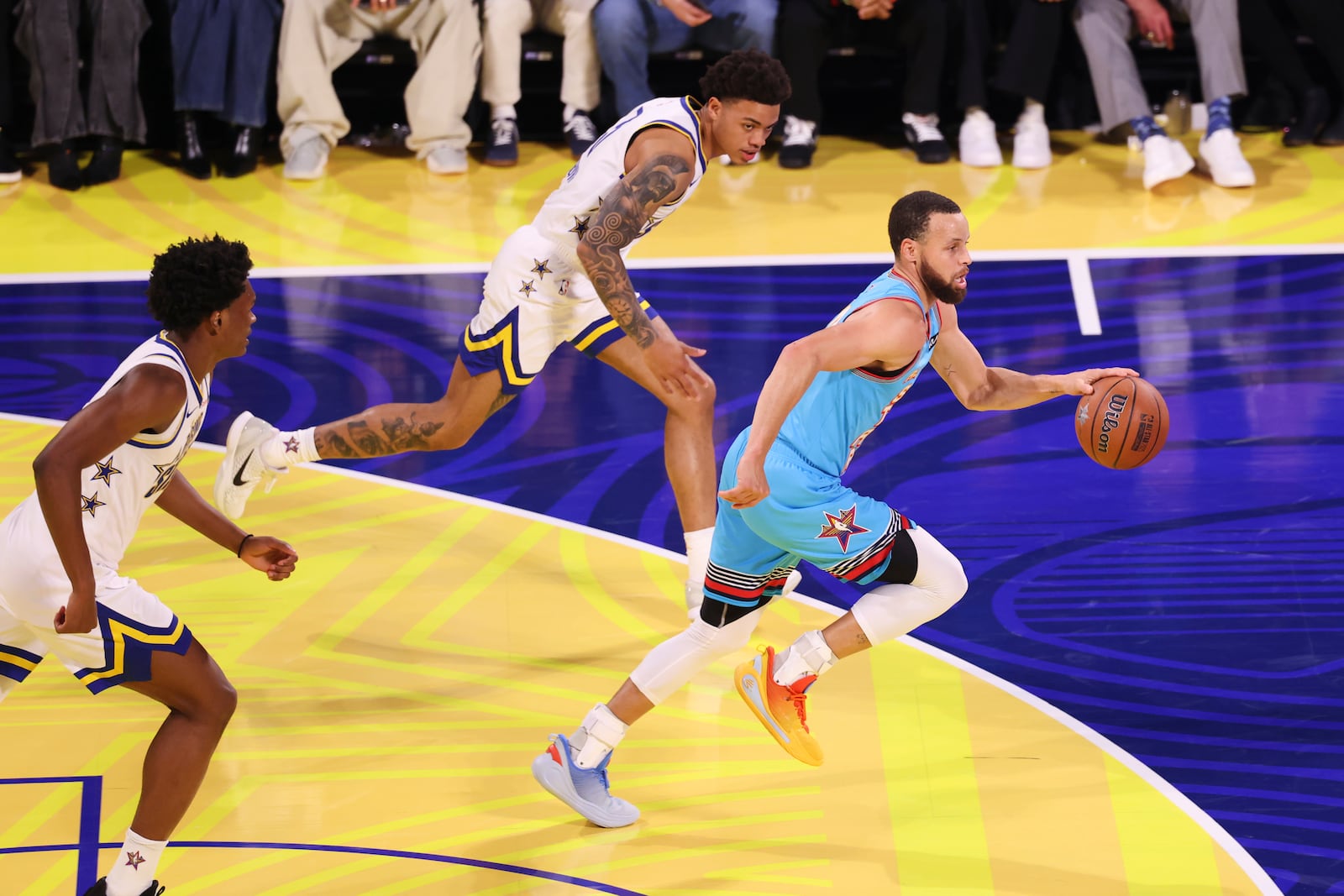 Golden State Warriors guard Stephen Curry dribbles up court during the NBA All-Star basketball game Sunday, Feb. 16, 2025, in San Francisco. (AP Photo/Jed Jacobsohn)