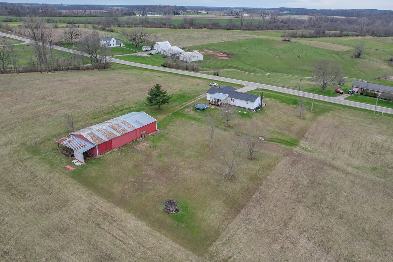 The house sits on large lot and backs to surrounding farmland. It also includes an oversized yard barn with two large doors and one entry door and electricity.