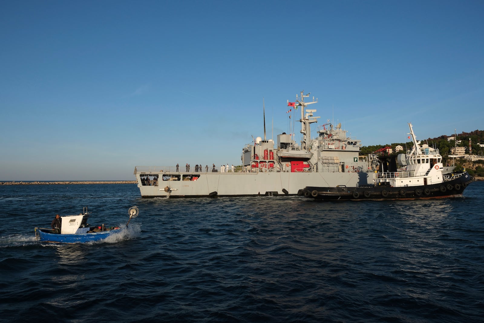 The Italian navy ship Libra as it arrives at the port of Shengjin, northwestern Albania Wednesday, Oct. 16, 2024, carrying the first group of migrants who were intercepted in international waters. (AP Photo/Vlasov Sulaj)