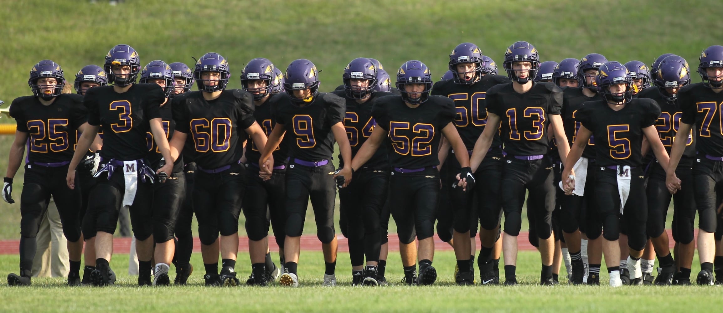 Photos: Mechanicsburg beats Kenton Ridge 27-3 in Week 1