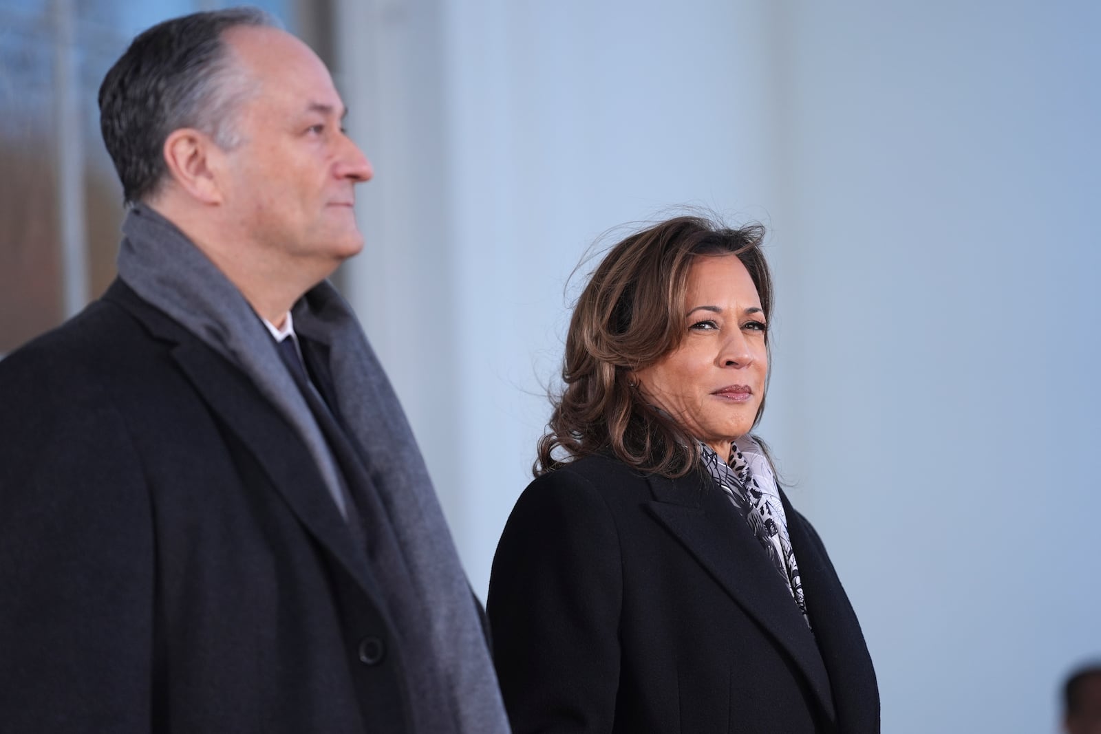 Vice President Kamala Harris, right, and second gentleman Doug Emhoff stand before greeting Vice President-elect JD Vance and Usha Vance at the White House, Monday, Jan. 20, 2025, in Washington. (AP Photo/Evan Vucci)