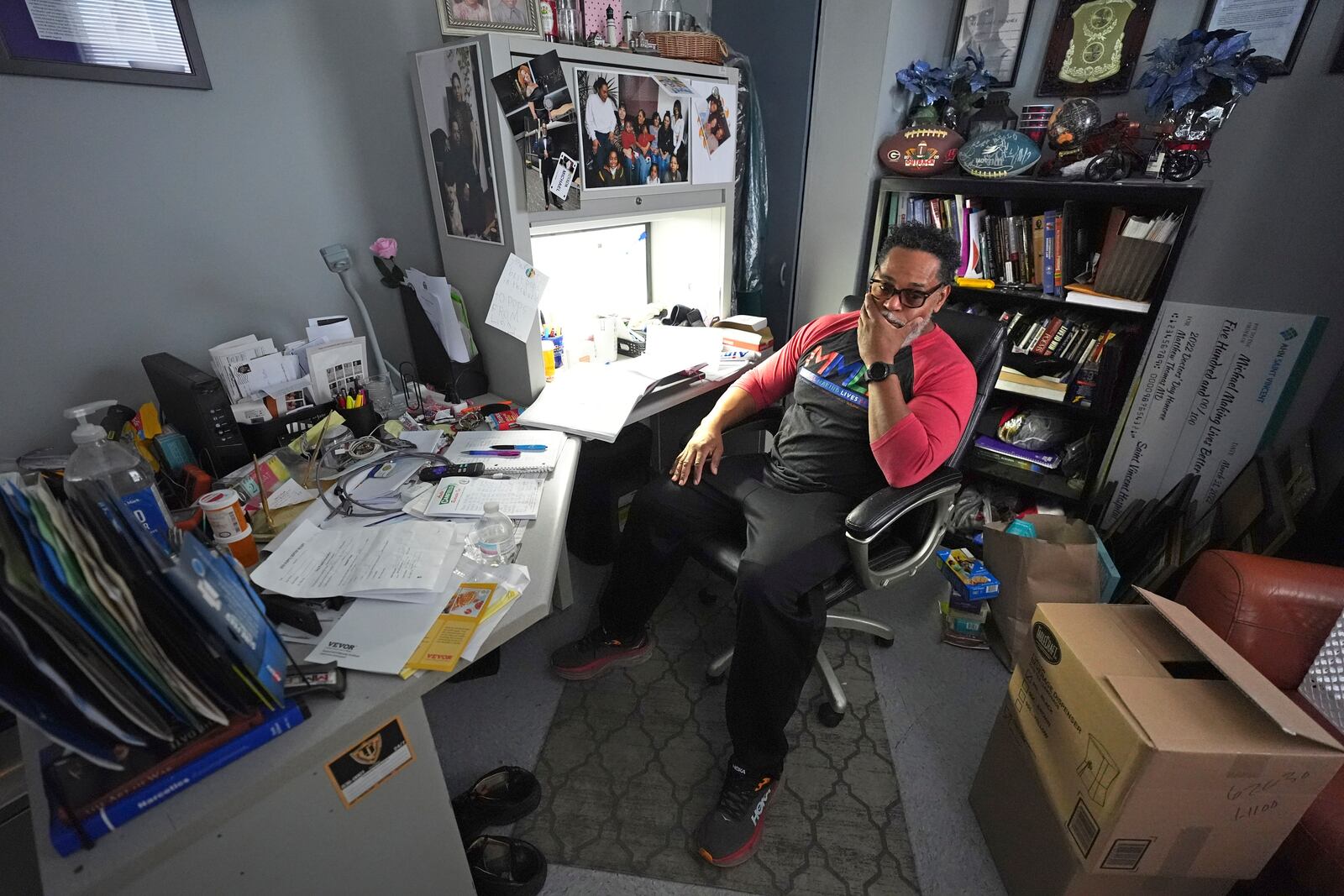 Small business owner Michael Hooks sits in the office of his catering business in Erie, Pa. Friday, Nov. 1, 2024. (AP Photo/Gene J. Puskar)