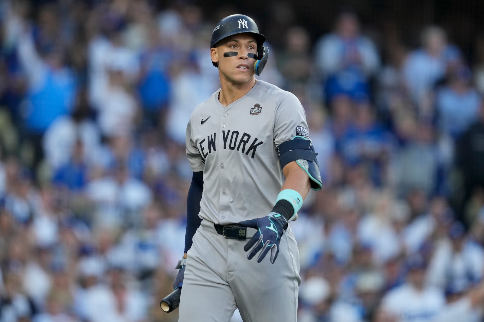 New York Yankees' Aaron Judge reacts after striking out against the Los Angeles Dodgers during the first inning in Game 1 of the baseball World Series, Friday, Oct. 25, 2024, in Los Angeles. (AP Photo/Ashley Landis)