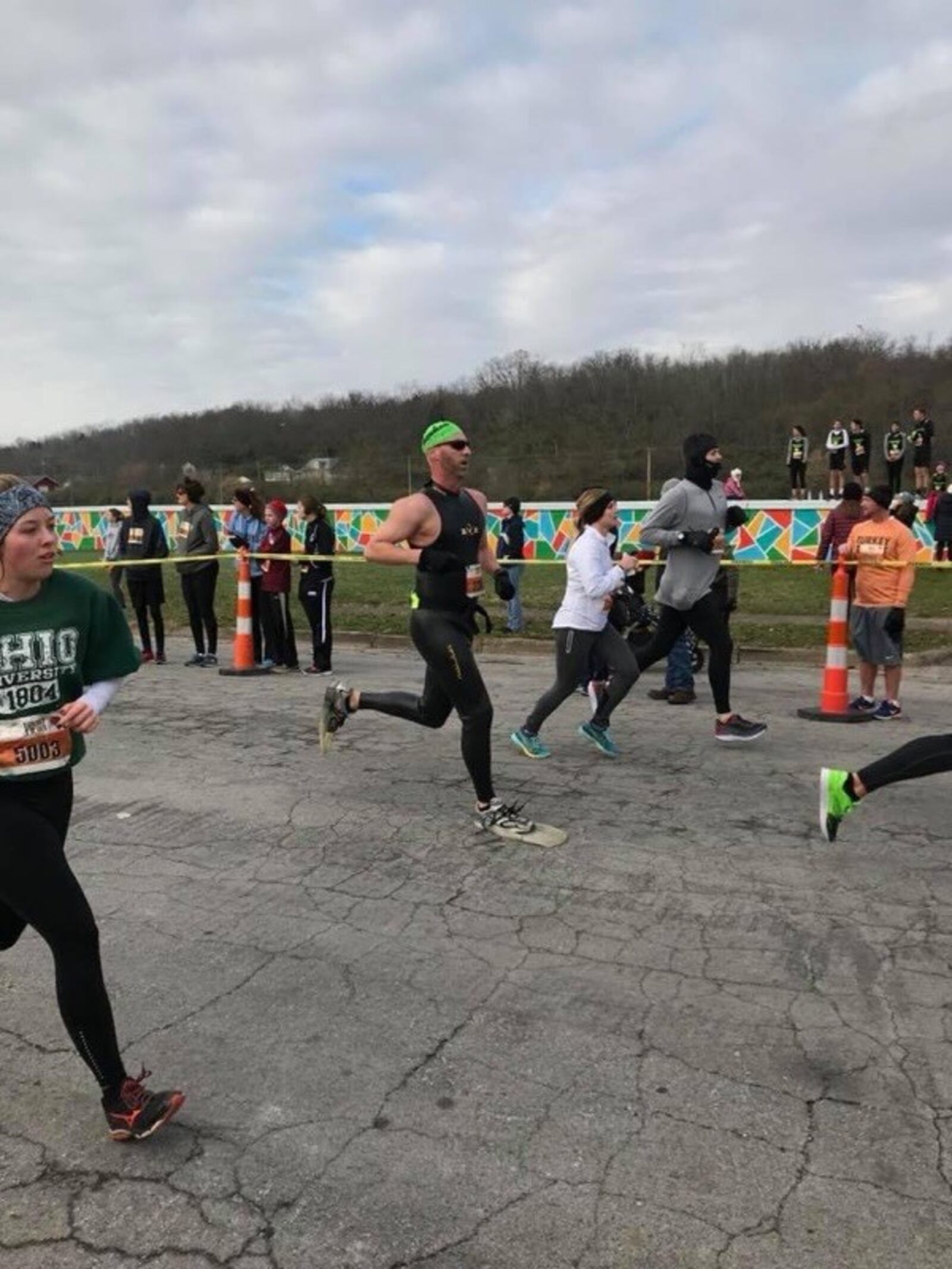 Flipperman, the alter ego of Springfield police lieutenant Brett Bauer, has been a crowd-favorite runner among the 8,500 to 9,000 who compete in the in the Turkey Trot every Thanksgiving morning in Miamisburg. This year because of the COVID-19 pandemic, the race is being run virtually and will feature a “Who Can Beat Flipperman?” contest. Bauer, a Wayne High School grad and one-time triathlete, has run the Turkey Trot wearing flippers, wet suit and swim cap every year since 1992.  CONTRIBUTED