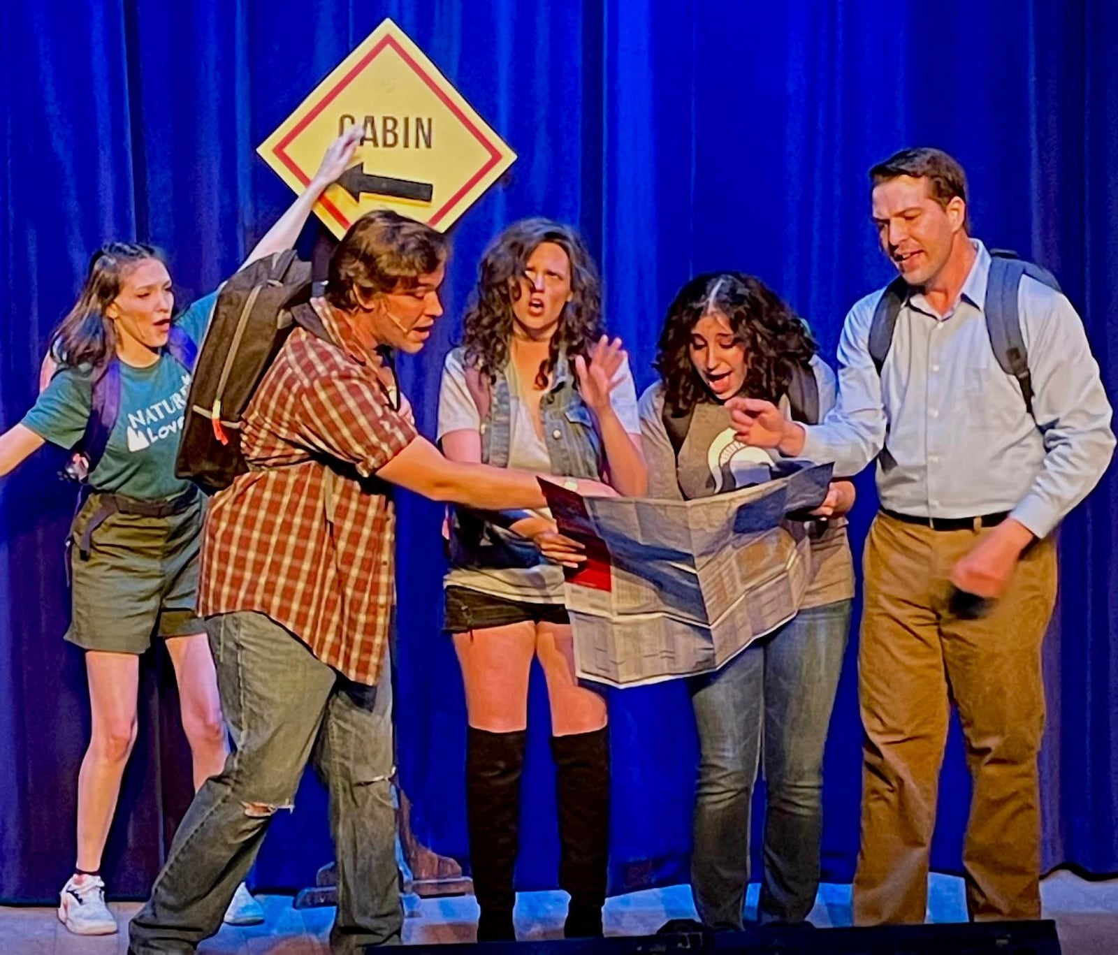 Left to right: Sarah Roddey (Cheryl), Jake Spicer (Scott), Madison Stapleton (Shelly), Shana Fishbein (Linda) and John Detty (Ash) in Dayton Playhouse's production of "Evil Dead: The Musical." PHOTO BY DAYTON PLAYHOUSE